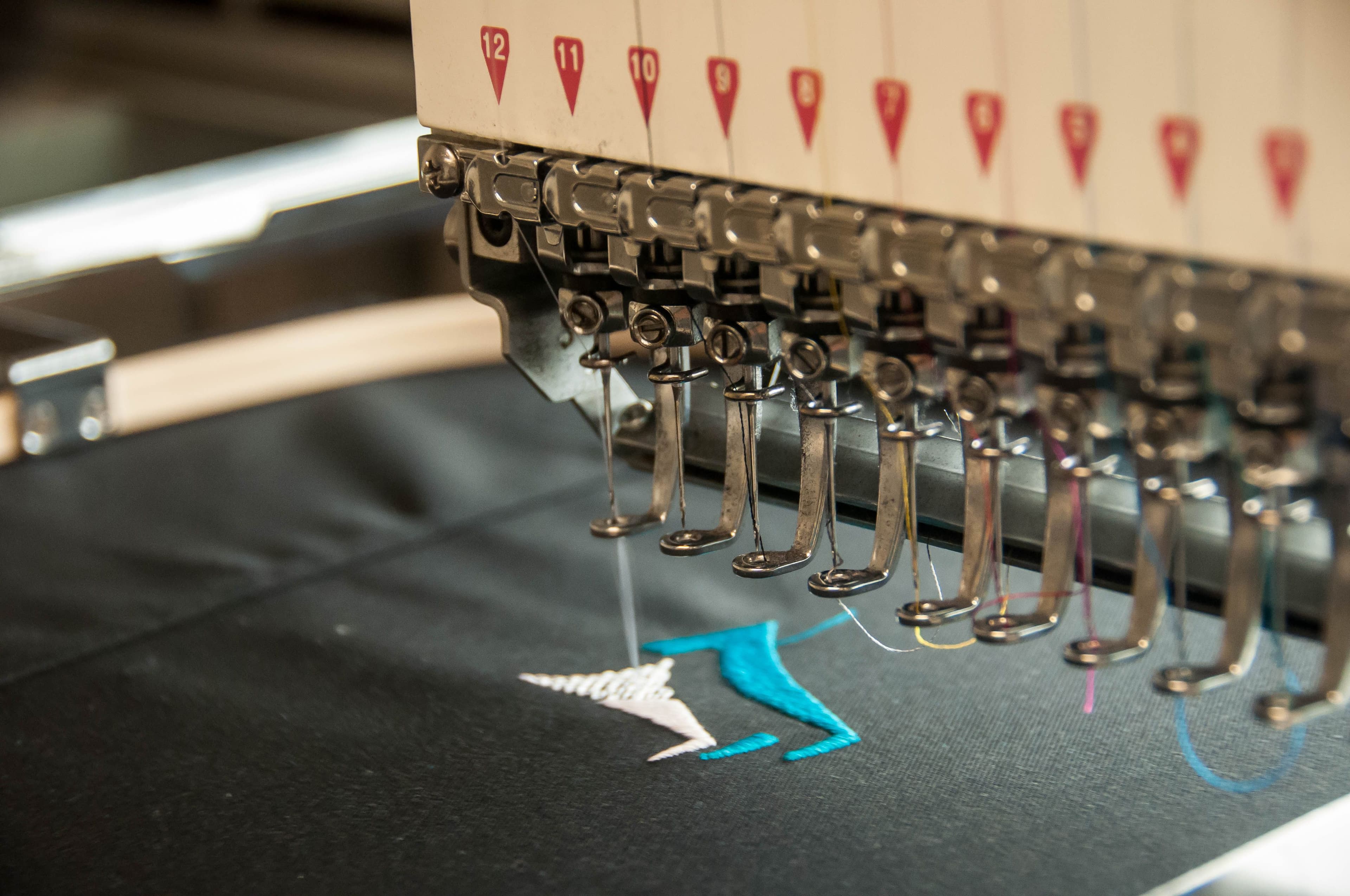 Hi-tech Embroidery logo